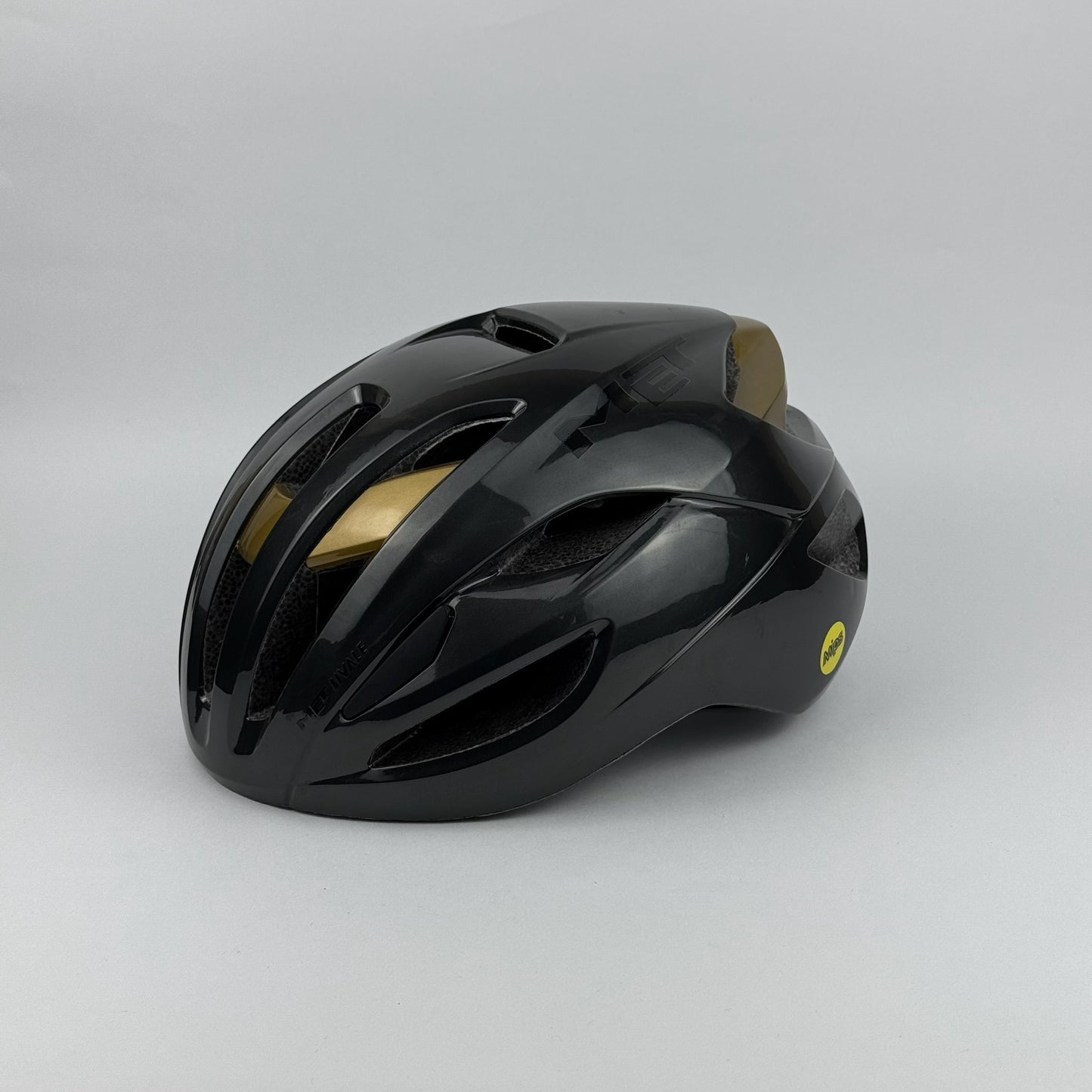 casco gris/dorado MET