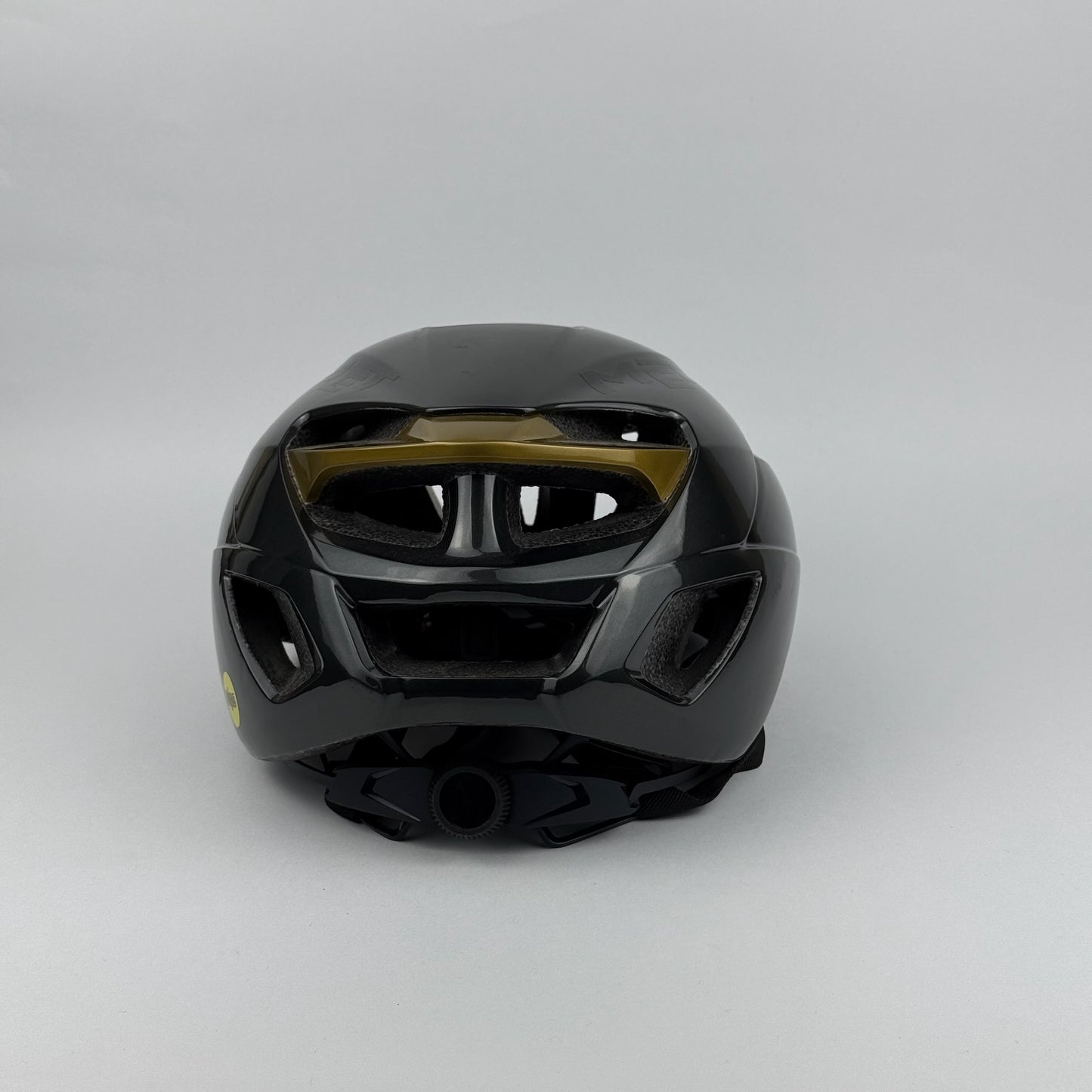 casco gris/dorado MET