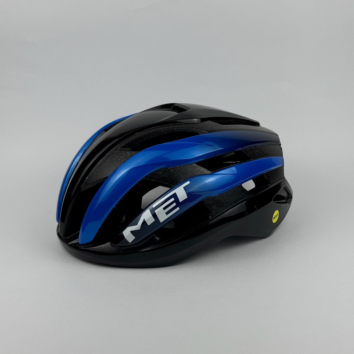 casco negro azul MET