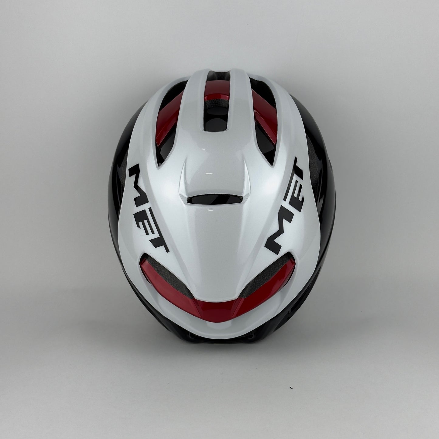 casco blanco con negro y rojo MET - Route Store Ctg
