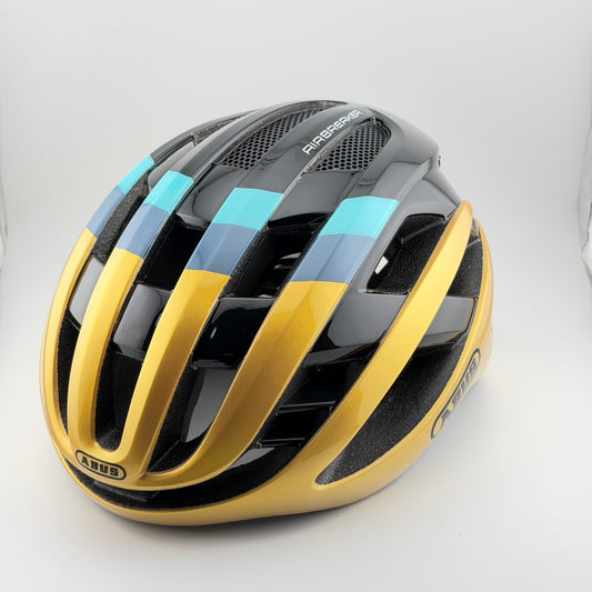 Casco abus airbreaker edición gold - Route Store Ctg